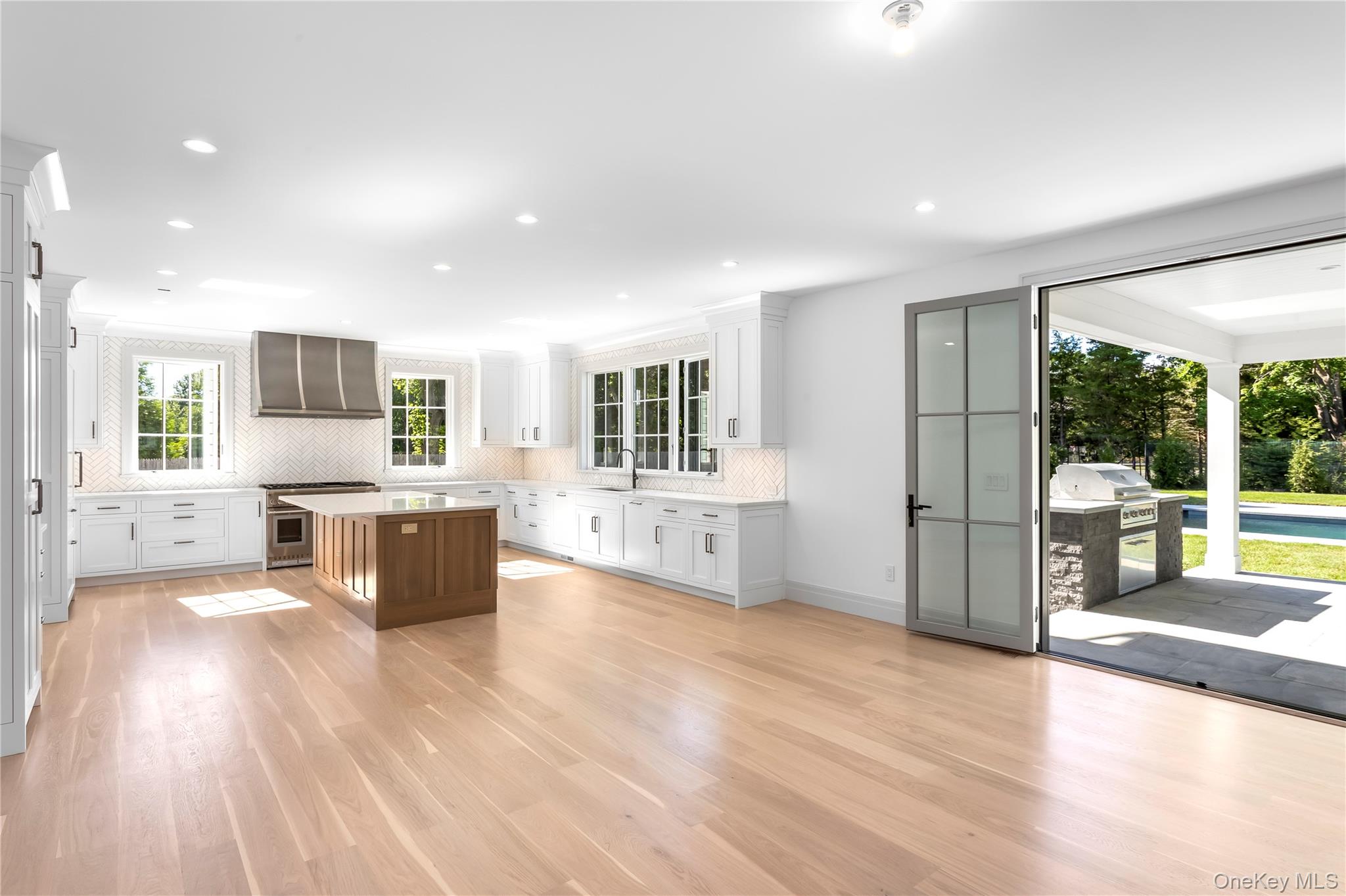 152 South Road Westhampton, NY 11977 - Photo 10 of 26 Open Chef's Kitchen & Dining Area