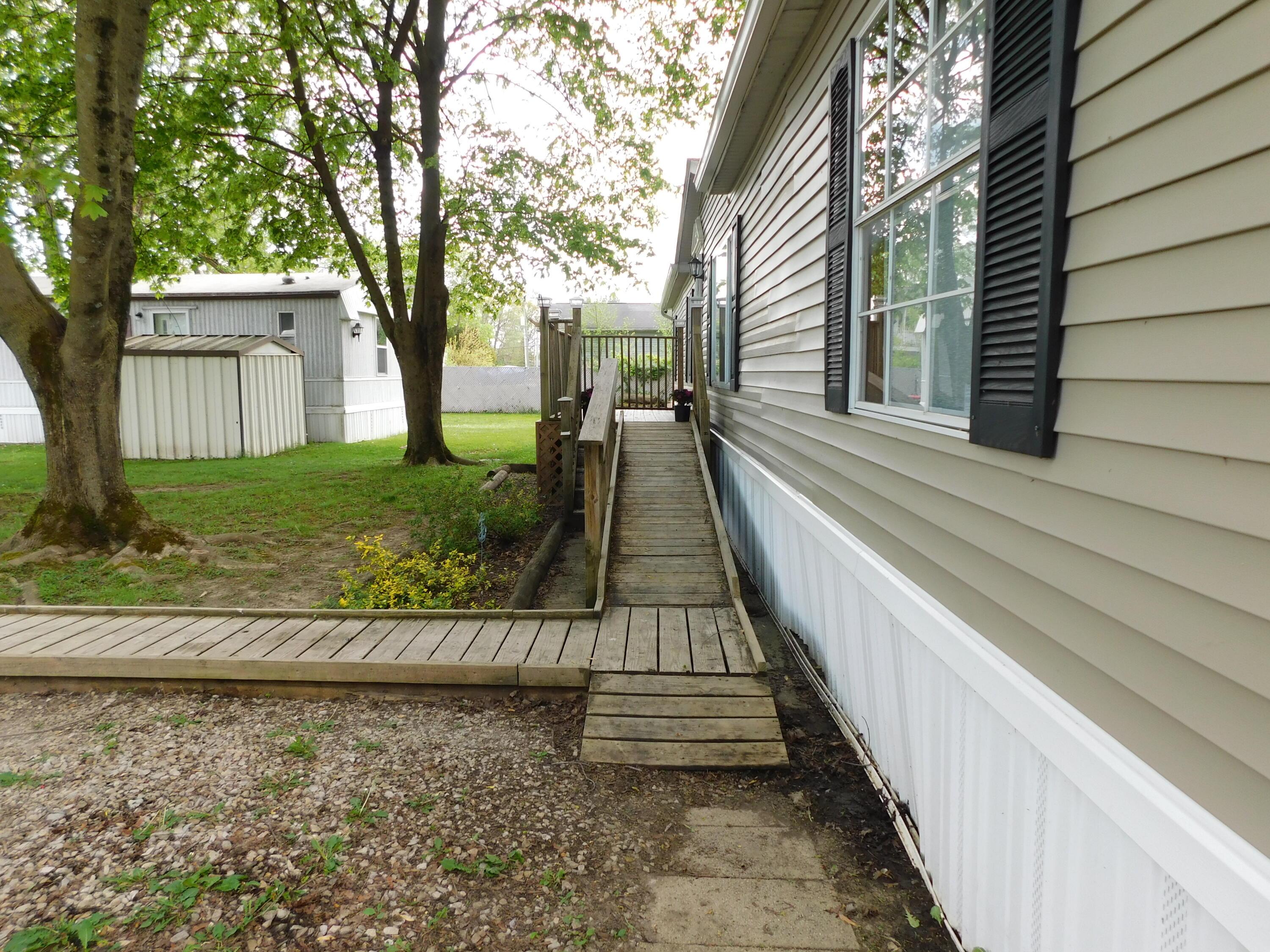 4711 Walnut Road, Unit LOT H8 Buckeye Lake, OH 43008 - Photo 4 of 42 Walkway leading to the front door.