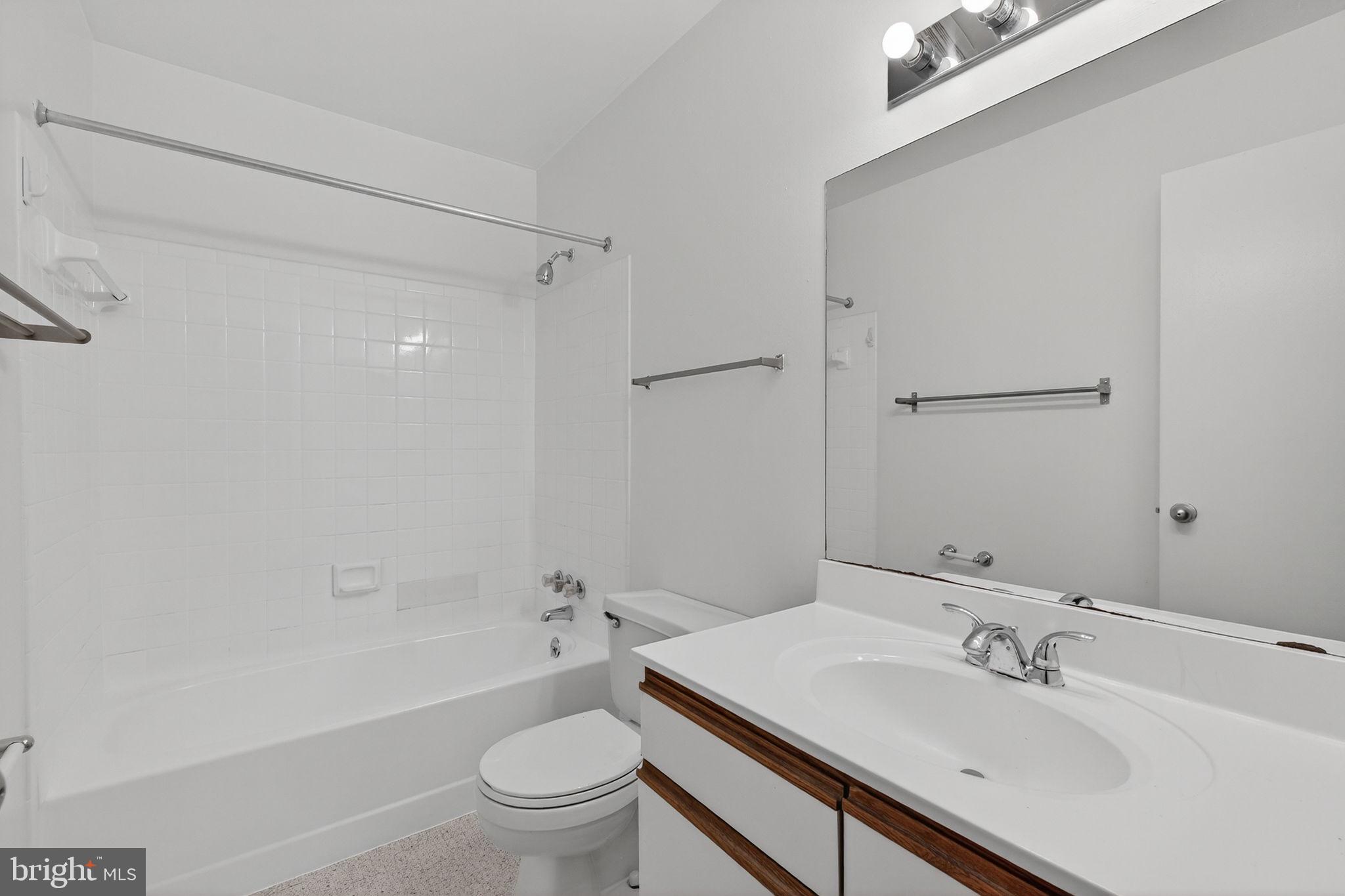 2441 18th Street Northwest, Unit 5 Washington, DC 20009 - Photo 15 of 23 a bathroom with a sink toilet and shower