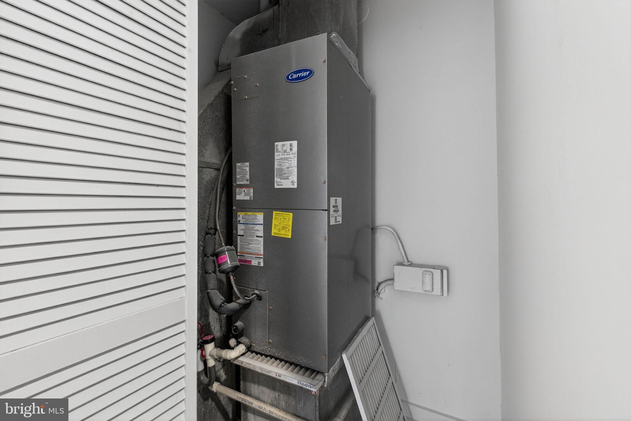 2441 18th Street Northwest, Unit 5 Washington, DC 20009 - Photo 23 of 23 a utility room with dryer and washer