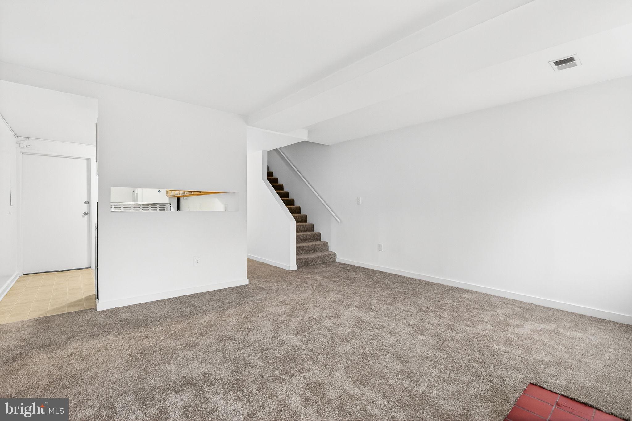 2441 18th Street Northwest, Unit 5 Washington, DC 20009 - Photo 9 of 23 an empty room with a kitchen