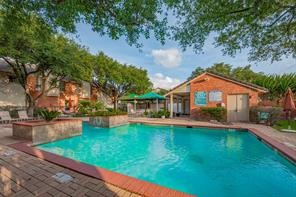 2211 South Kirkwood Road, Unit 28 Houston, TX 77077 - Photo 2 of 5 a front view of house with yard and green space