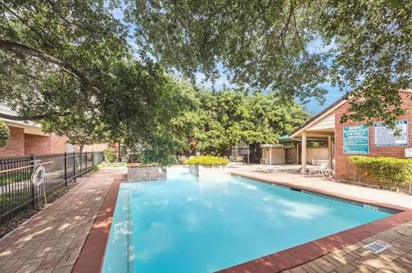 2211 South Kirkwood Road, Unit 28 Houston, TX 77077 - Photo 8 of 9 a view of a house with backyard and sitting area