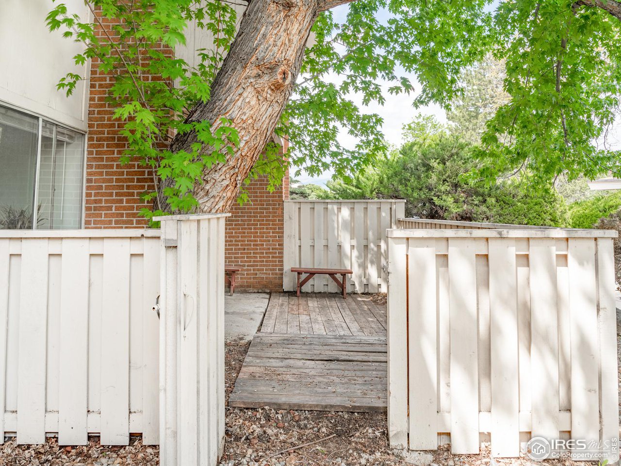 5116 Williams Fork Trail, Unit 103 Boulder, CO 80301 - Photo 16 of 20 a view of a wooden fence