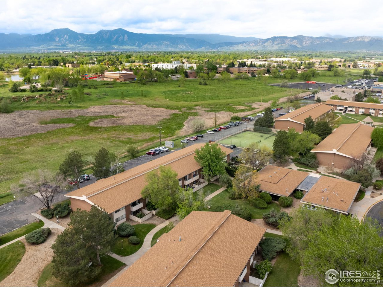 5116 Williams Fork Trail, Unit 103 Boulder, CO 80301 - Photo 18 of 20 an aerial view of residential houses with outdoor space and river