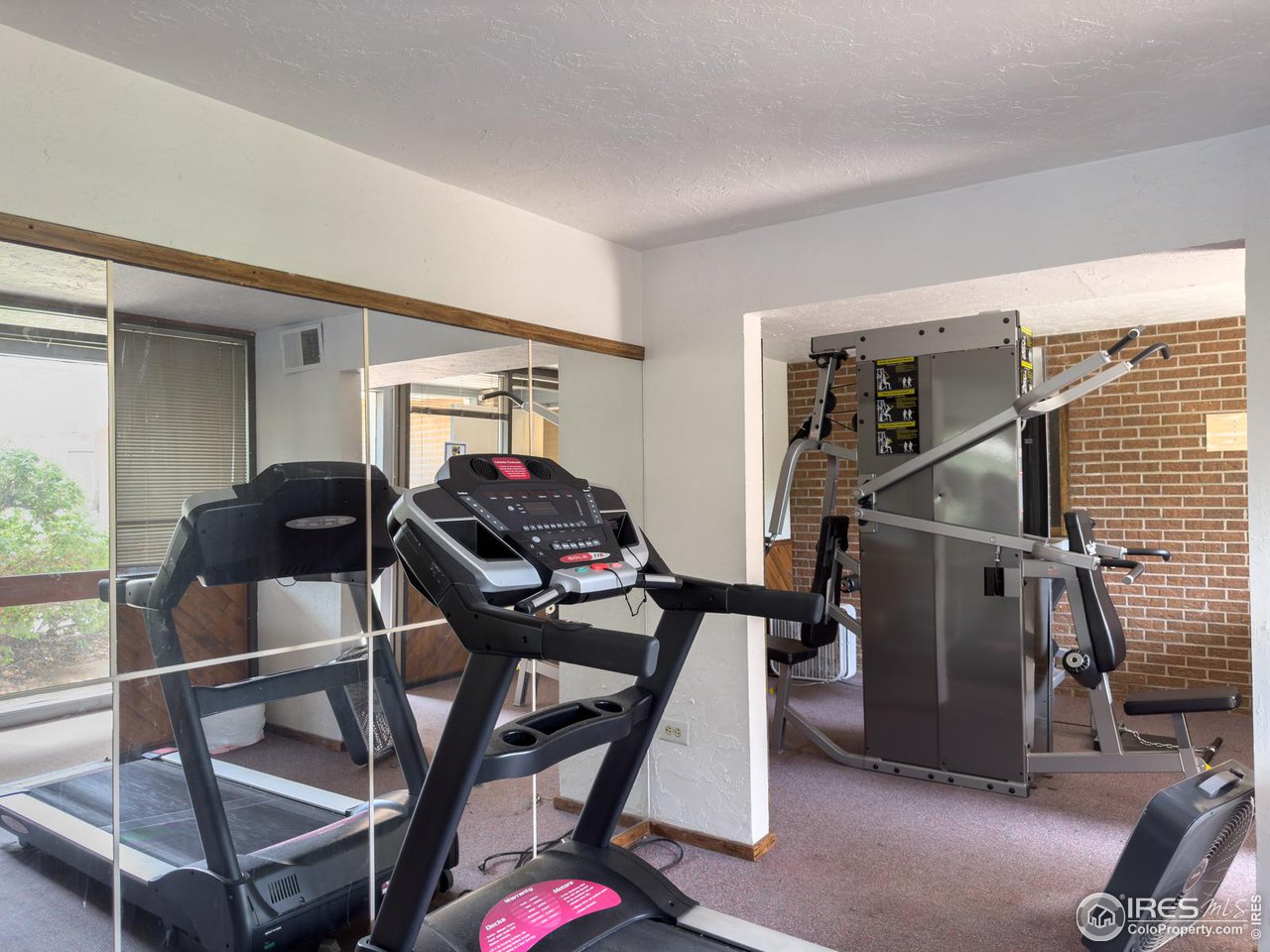 5116 Williams Fork Trail, Unit 103 Boulder, CO 80301 - Photo 20 of 20 a view of a workspace with furniture and a window