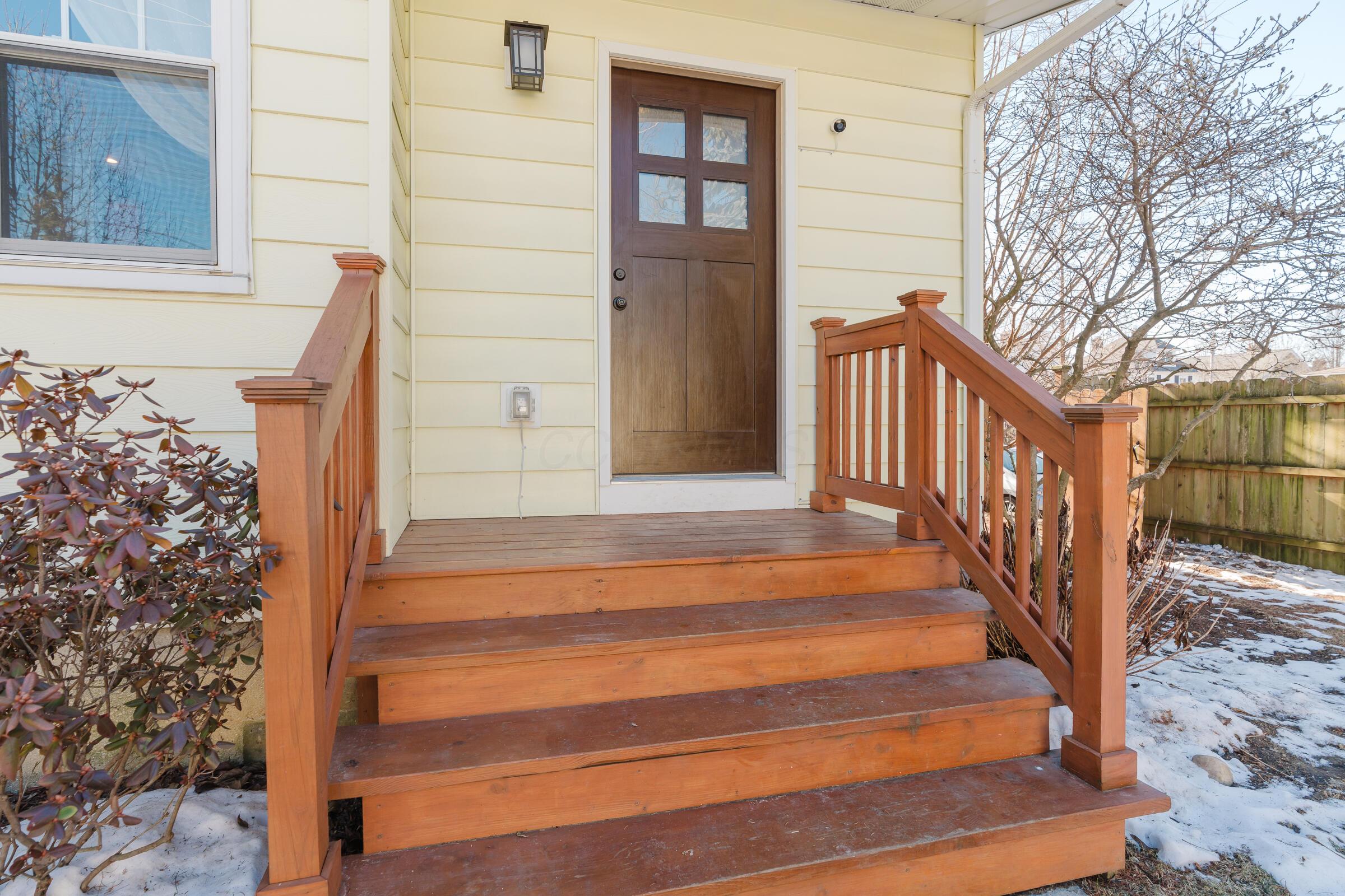 278 Crestview Road Columbus, OH 43202 - Photo 6 of 50 Back door and decking lead to the fenced yard.