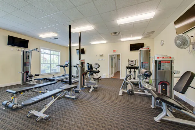 a view of yard with swimming pool and furniture
