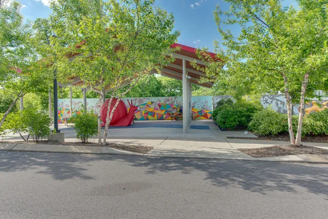 a view of a building with a garden