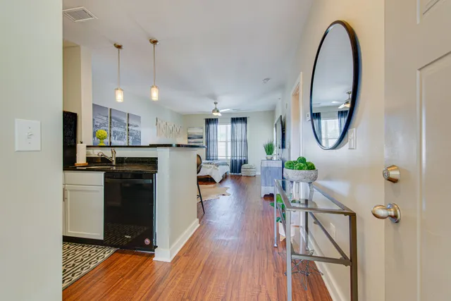 a kitchen with a sink stove and microwave