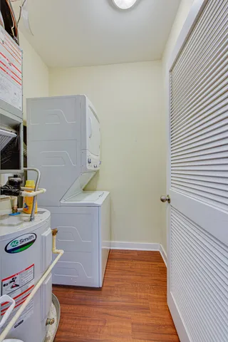 a view of kitchen with furniture and wooden floor