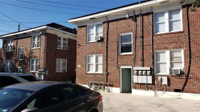 a view of a building with a street
