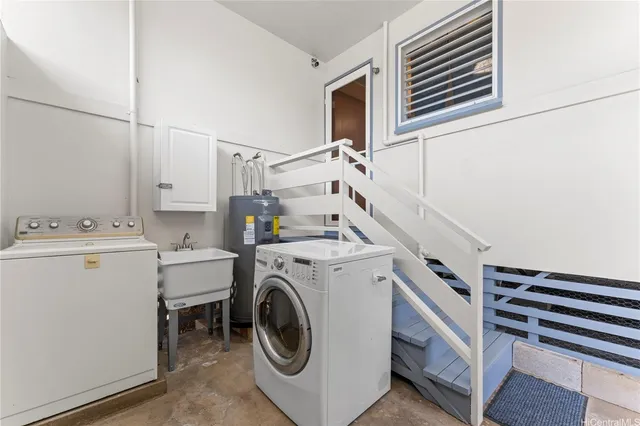 a utility room with dryer and washer