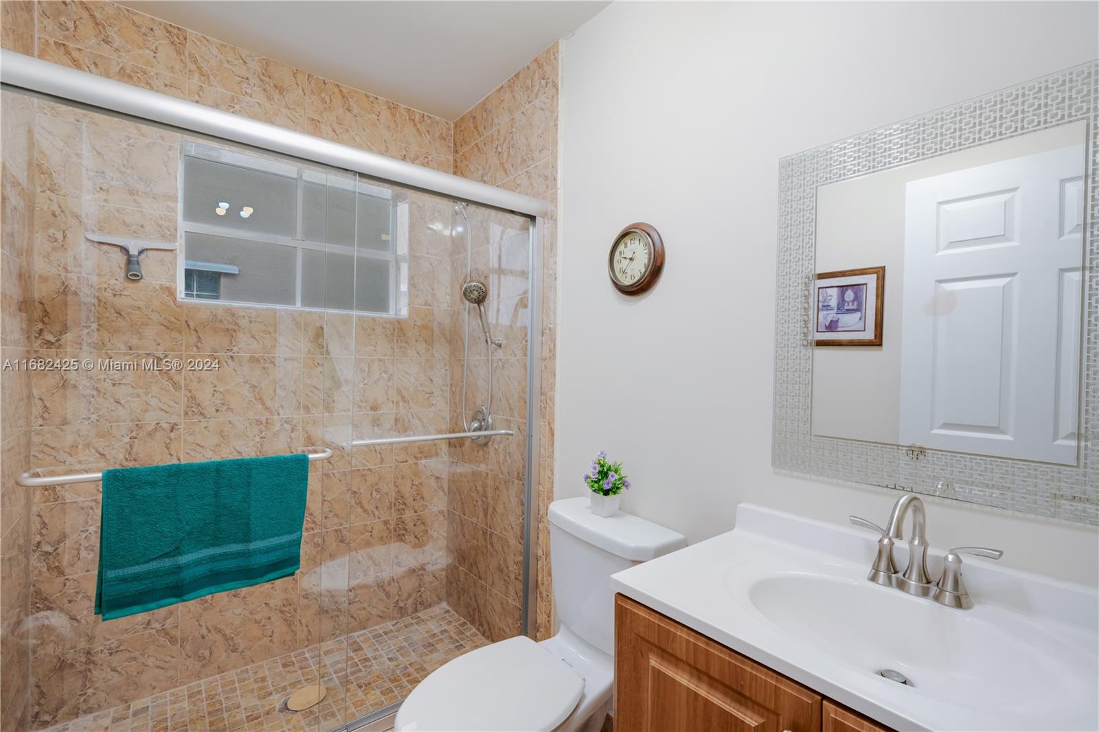 16358 Southwest 82nd Terrace Miami, FL 33193 - Photo 27 of 37 a bathroom with a sink toilet and shower