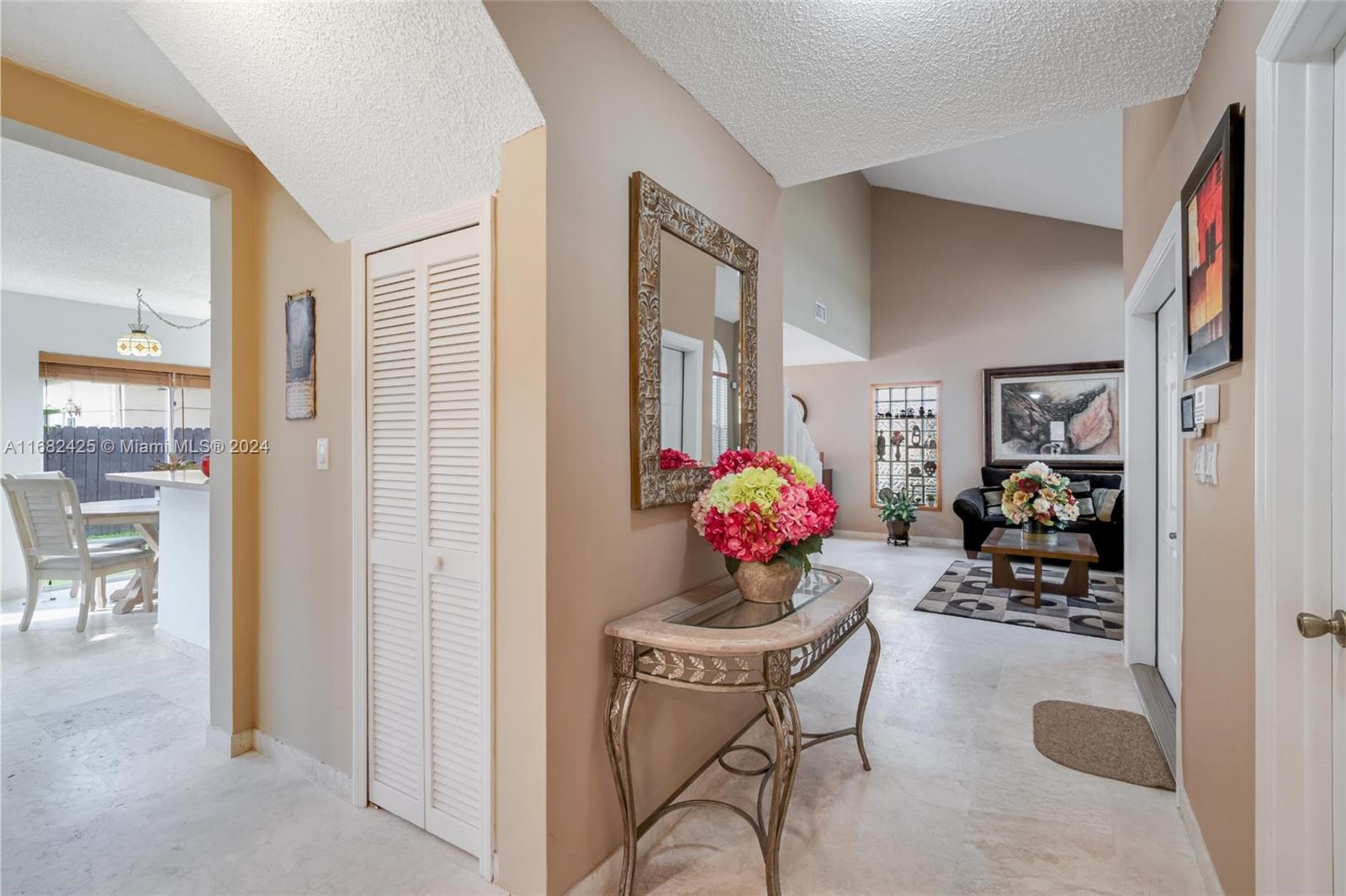 16358 Southwest 82nd Terrace Miami, FL 33193 - Photo 31 of 37 a kitchen area with furniture and flowers