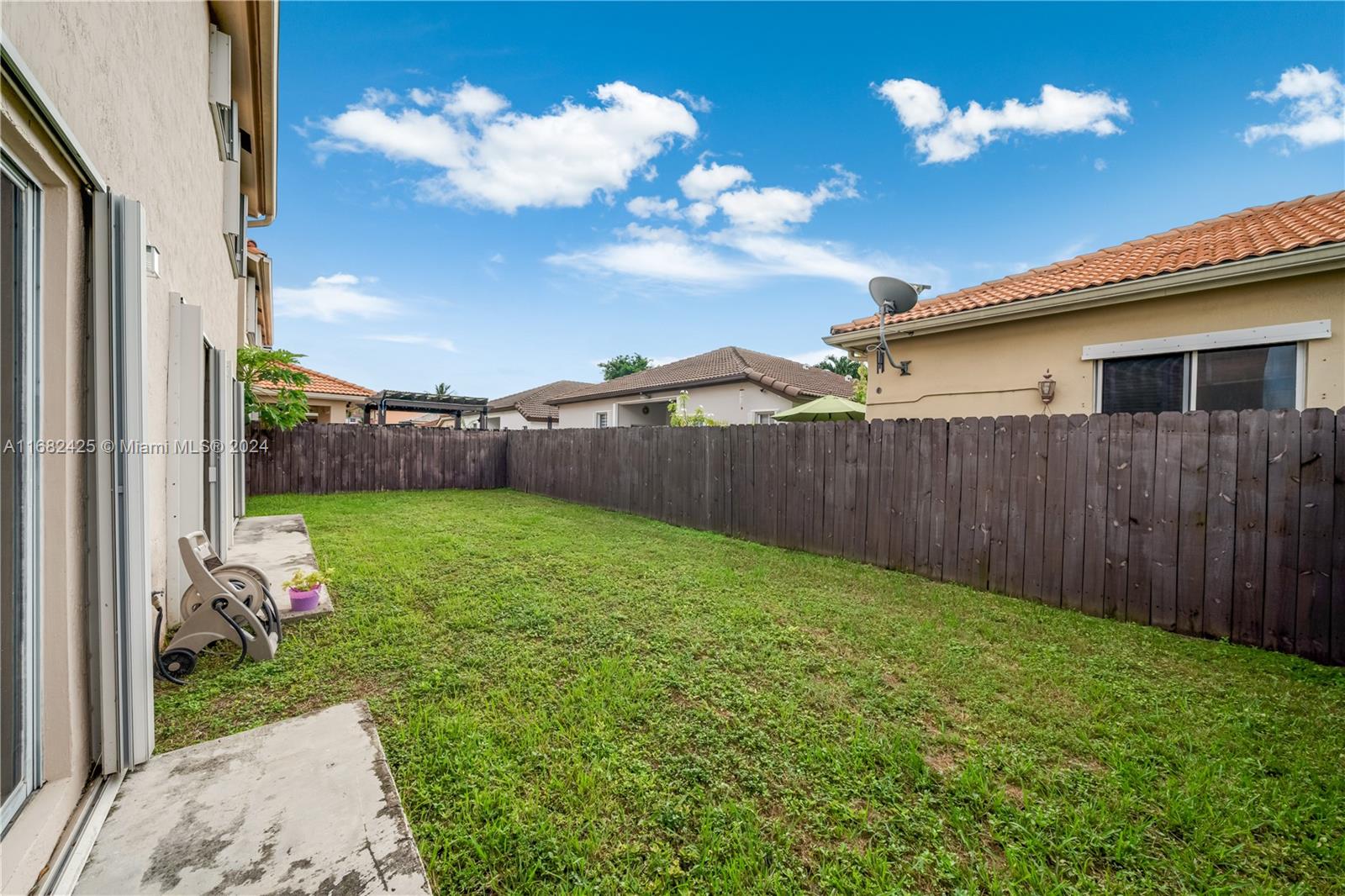 16358 Southwest 82nd Terrace Miami, FL 33193 - Photo 33 of 37 a view of a backyard with a garden