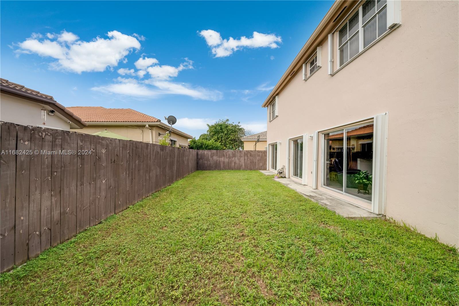 16358 Southwest 82nd Terrace Miami, FL 33193 - Photo 34 of 37 a view of backyard with a garden and plants