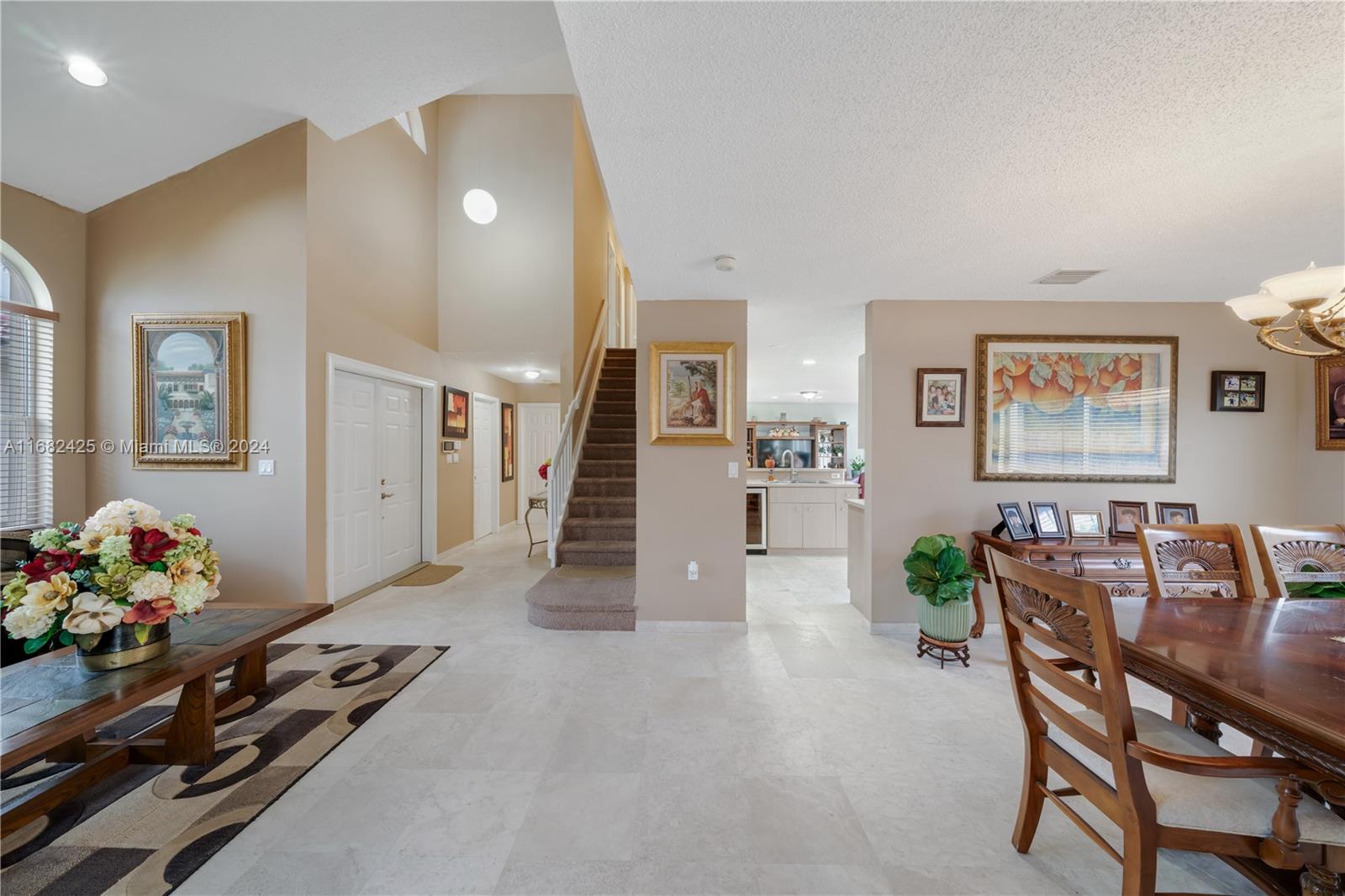 16358 Southwest 82nd Terrace Miami, FL 33193 - Photo 8 of 37 a dining room with furniture and wooden floor