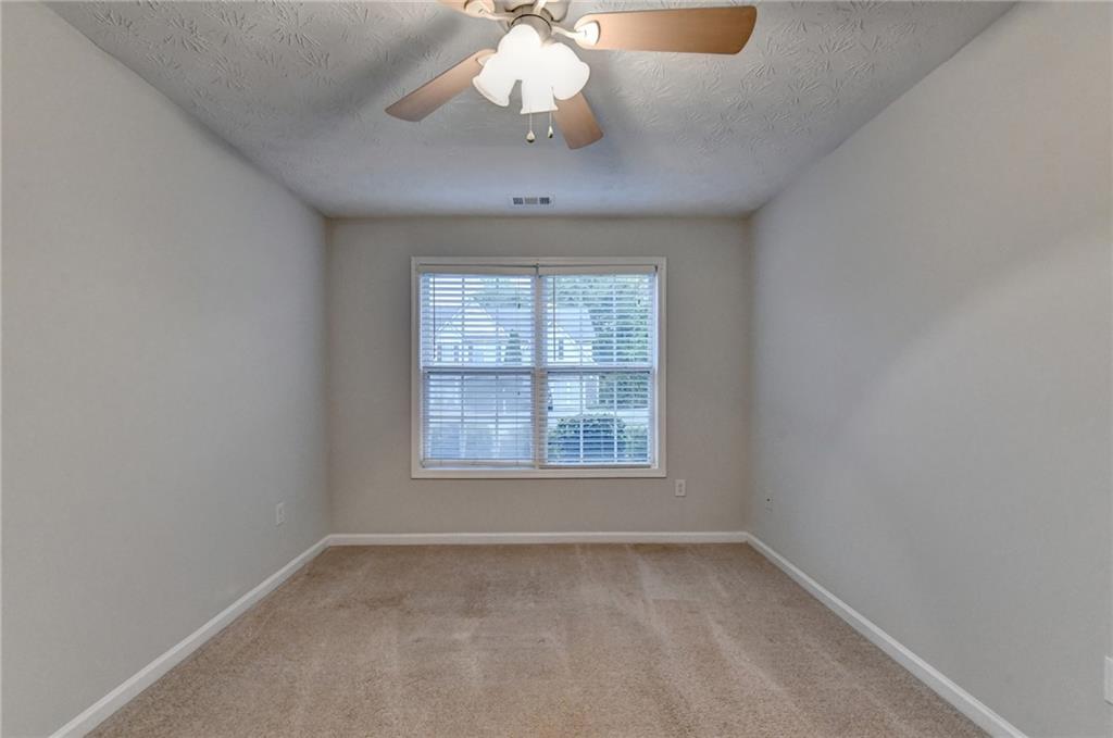 310 Andrew Ridge Drive Jefferson, GA 30549 - Photo 41 of 52 an empty room with a window