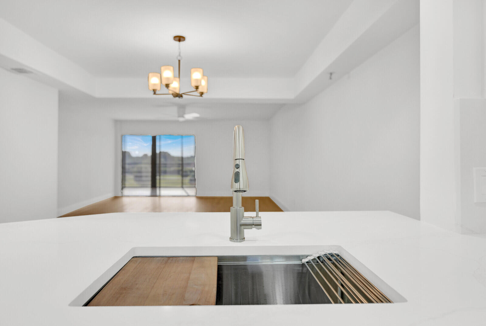 9260 Southwest 14th Street, Unit 2508 Boca Raton, FL 33428 - Photo 13 of 49 a view of a kitchen with granite countertop a sink and dishwasher with wooden floor