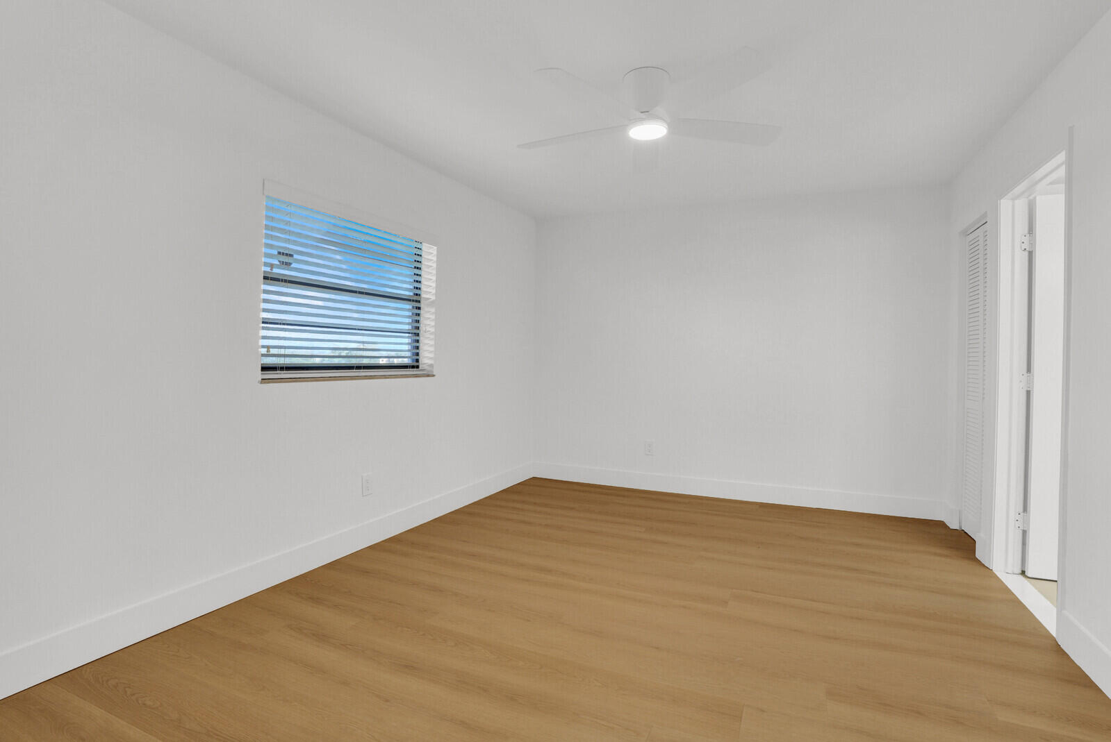 9260 Southwest 14th Street, Unit 2508 Boca Raton, FL 33428 - Photo 29 of 49 a view of empty room with wooden floor
