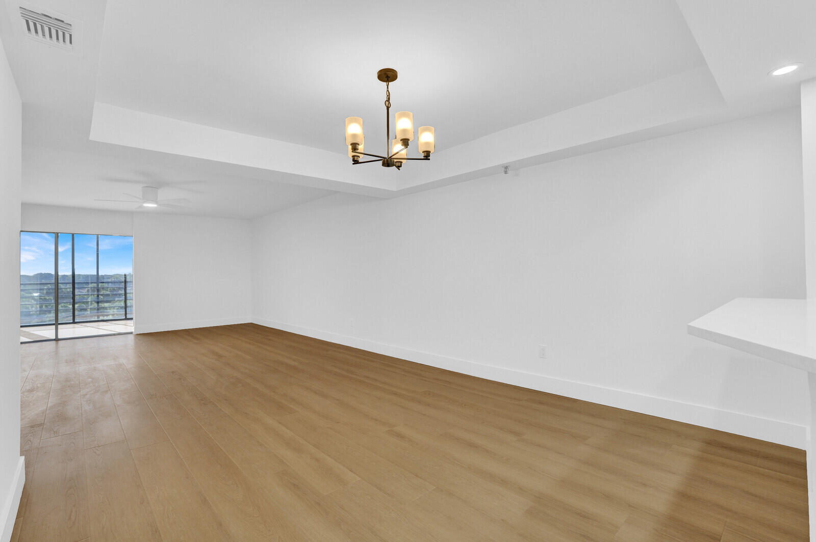 9260 Southwest 14th Street, Unit 2508 Boca Raton, FL 33428 - Photo 3 of 49 a view of an empty room with wooden floor