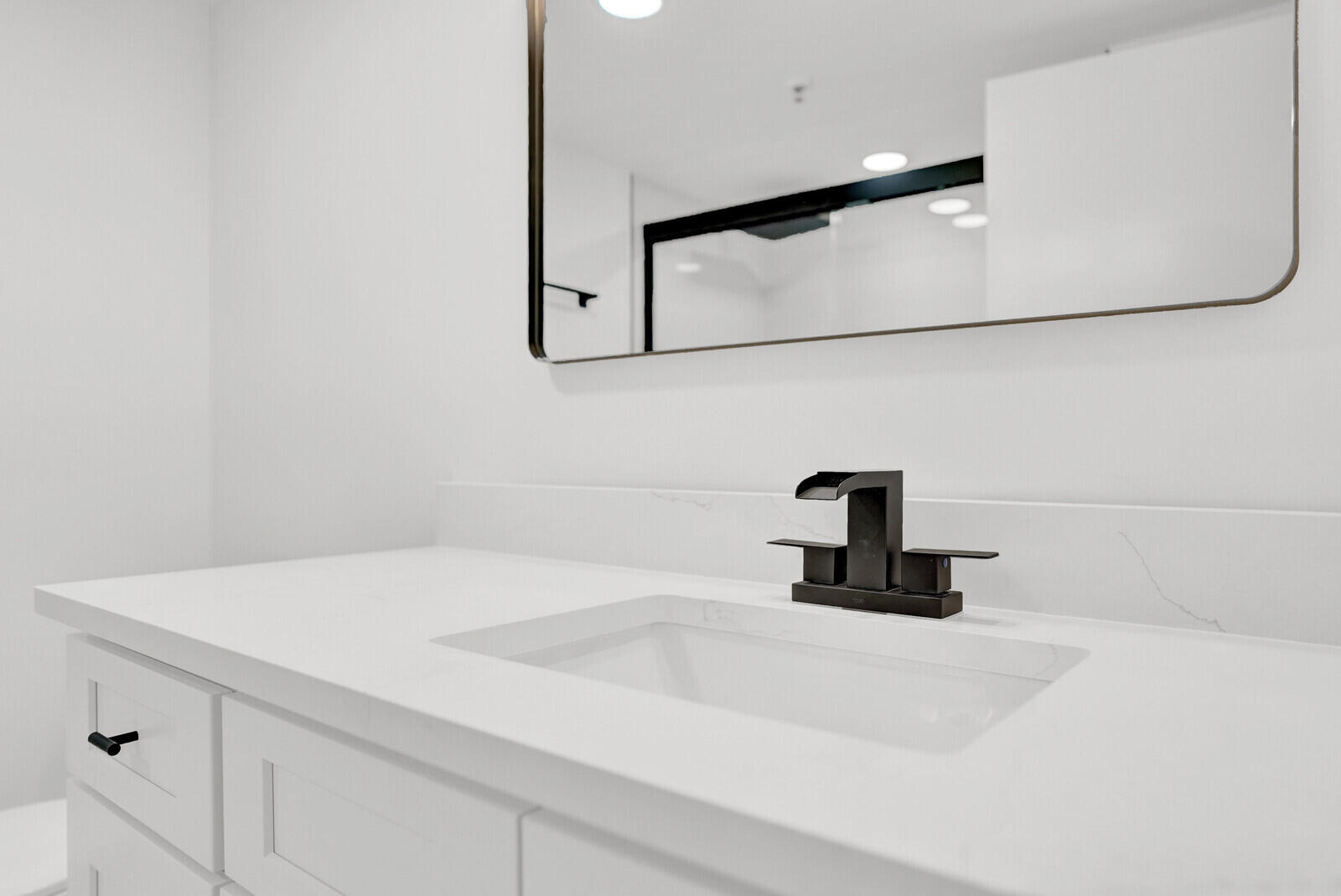 9260 Southwest 14th Street, Unit 2508 Boca Raton, FL 33428 - Photo 32 of 49 a close view of a sink a mirror and vanity in the bathroom