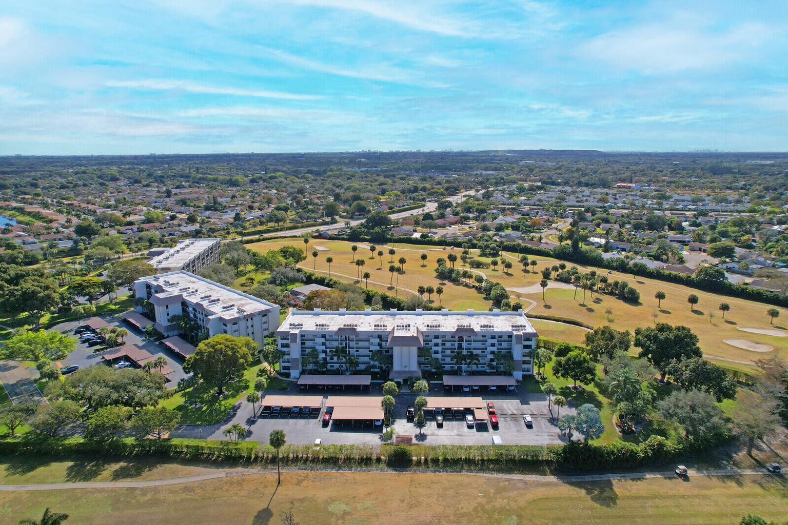 9260 Southwest 14th Street, Unit 2508 Boca Raton, FL 33428 - Photo 49 of 49 an aerial view of a house with a garden