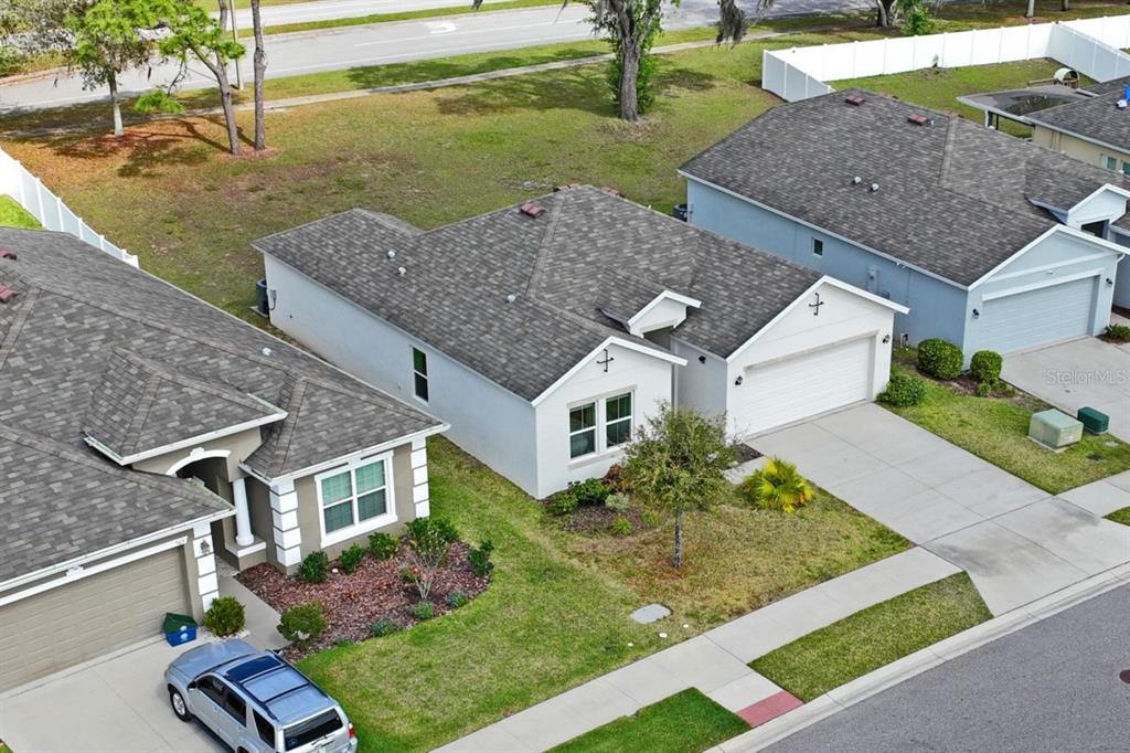 571 Old Windsor Way Spring Hill, FL 34609 - Photo 49 of 61 an aerial view of a house with garden space