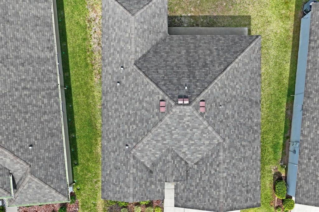 571 Old Windsor Way Spring Hill, FL 34609 - Photo 51 of 61 a aerial view of a house