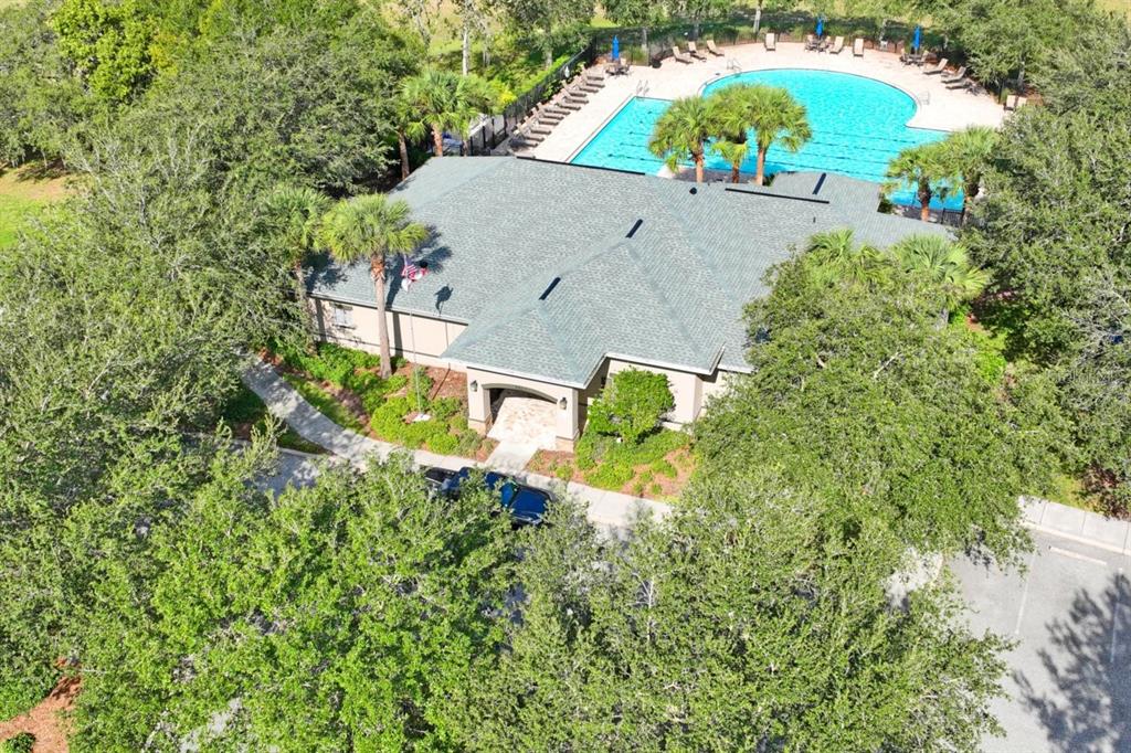 571 Old Windsor Way Spring Hill, FL 34609 - Photo 54 of 61 an aerial view of a house with a garden
