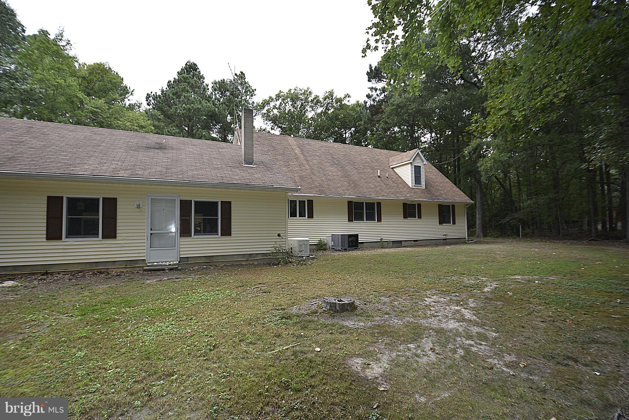 7901 Pea Neck Road St. Michaels, MD 21663 - Photo 22 of 25 Rear of home and attached garage