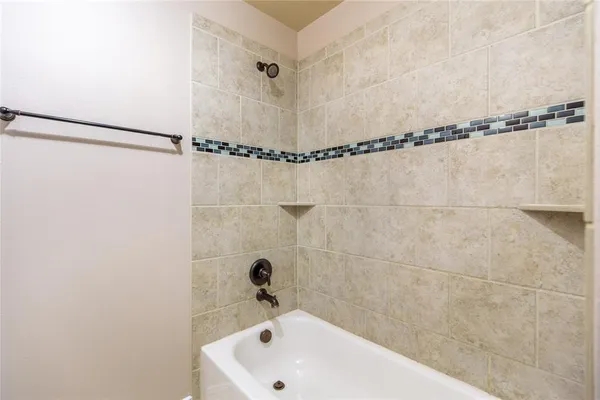 a bathroom with a sink and a bathtub