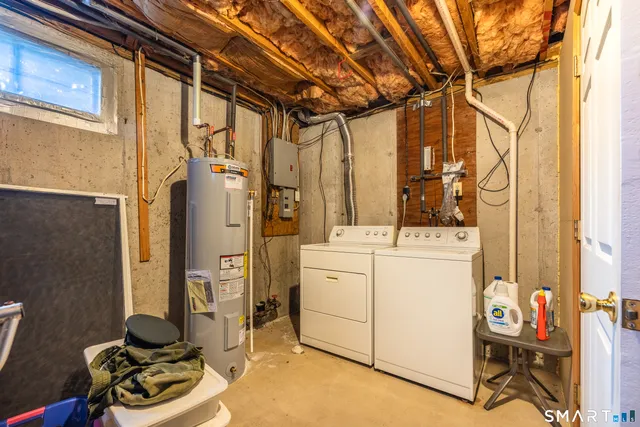 a view of a chair and table on the wooden floor