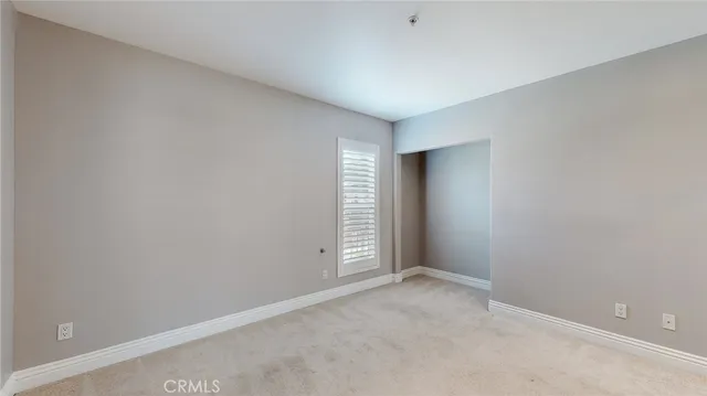 a view of an empty room with window