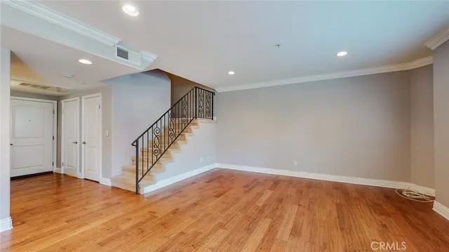 a view of entryway with wooden floor