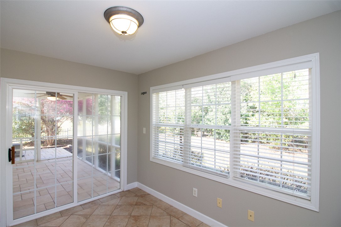 735 Britton Street Anderson, SC 29621 - Photo 17 of 50 This bright space offers serene outdoor access and abundant natural light through expansive windows.