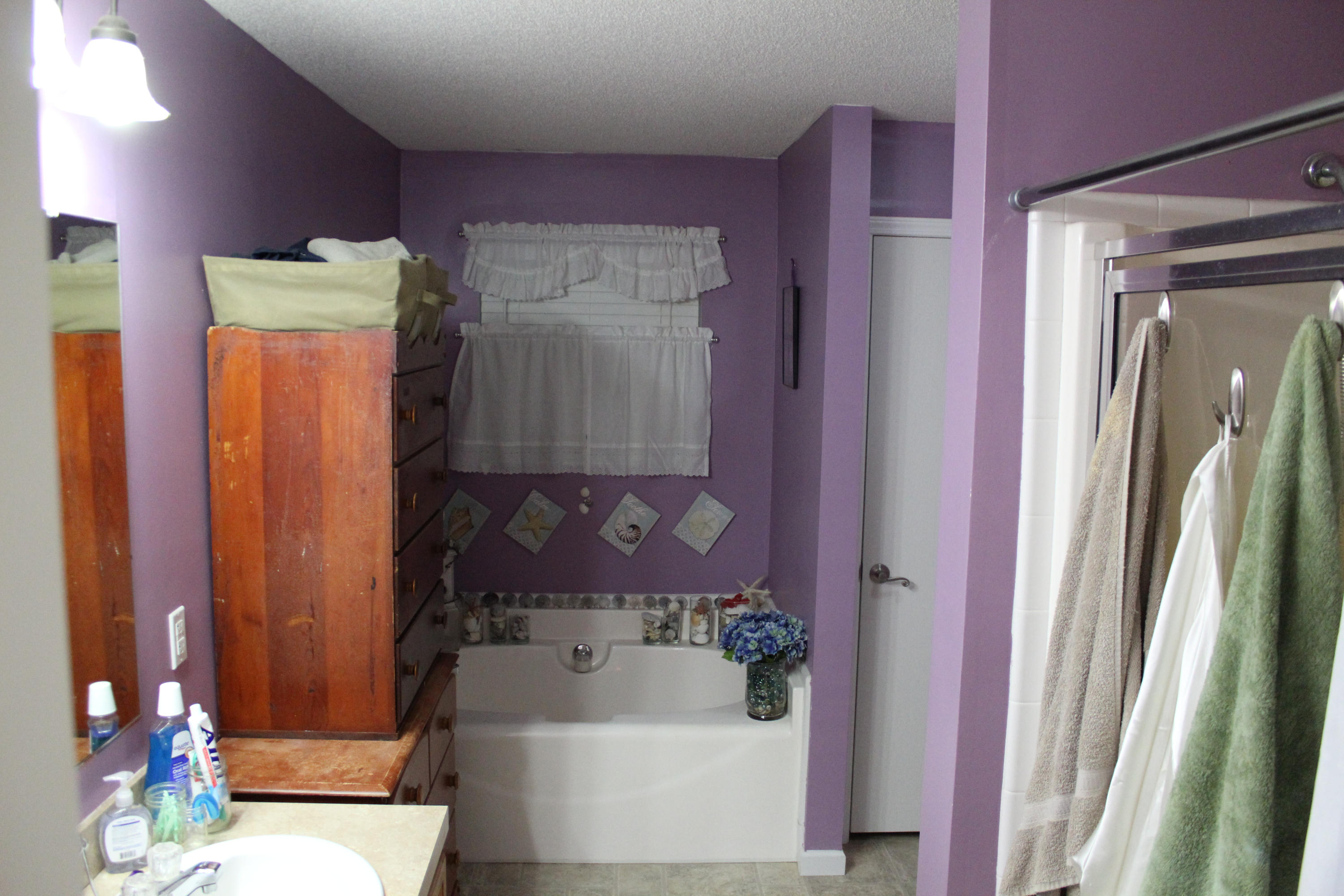 200 Kent Road Wirtz, VA 24184 - Photo 14 of 30 a bathroom with a bathtub and a shower