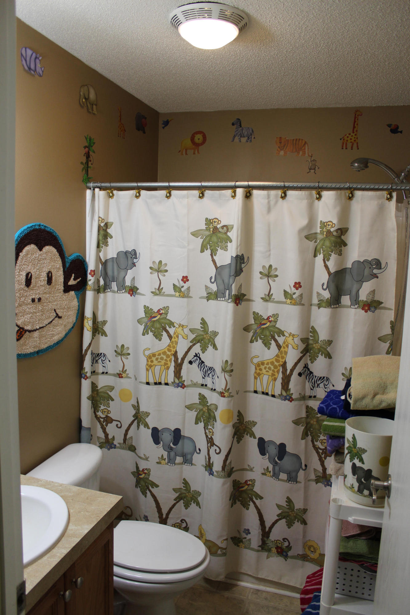 200 Kent Road Wirtz, VA 24184 - Photo 22 of 30 a bathroom with a toilet sink and shower curtain