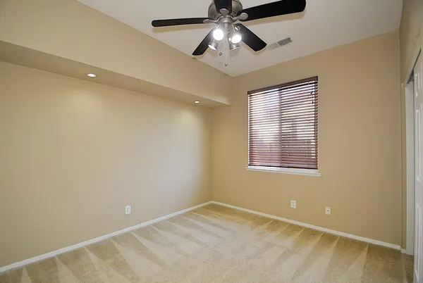 a view of a hallway with closet area