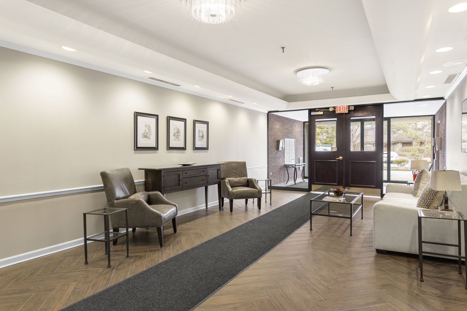 1140 Old Mill Road, Unit 304F Hinsdale, IL 60521 - Photo 3 of 21 a living room with furniture and large windows