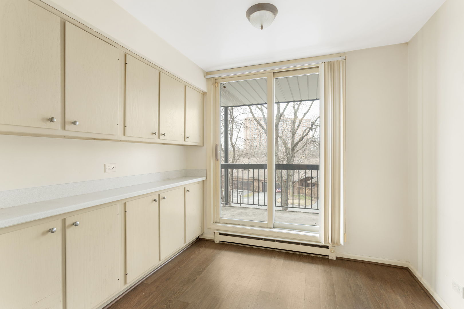 1140 Old Mill Road, Unit 304F Hinsdale, IL 60521 - Photo 10 of 21 a view of an empty room with a window