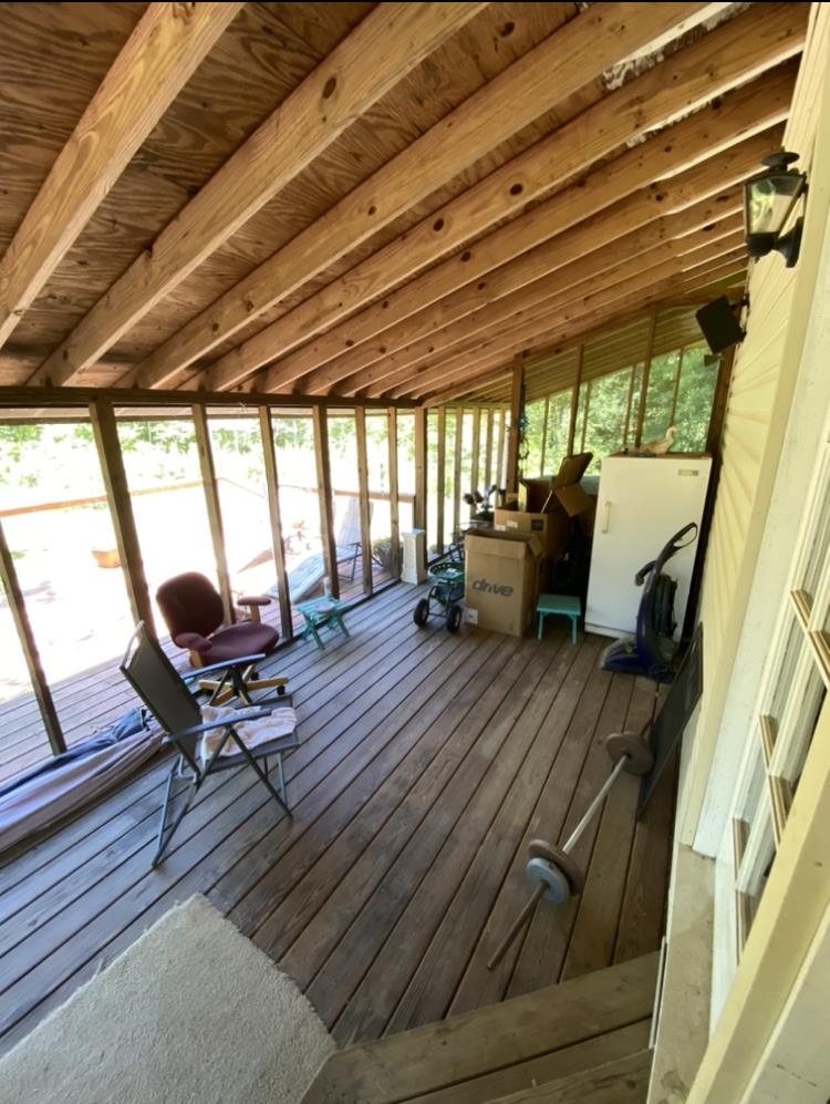 755 Old Toone Road Toone, TN 38381 - Photo 24 of 25 a living room with furniture and wooden floor