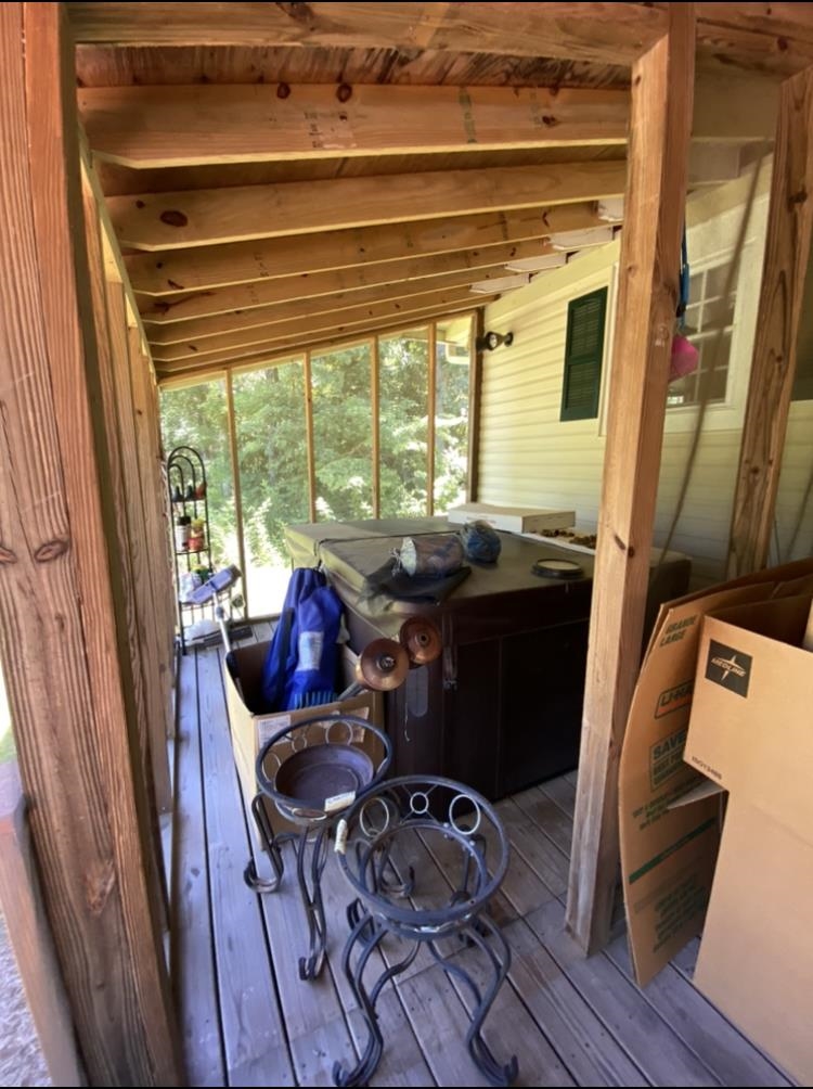 755 Old Toone Road Toone, TN 38381 - Photo 25 of 25 a view of balcony with chairs and wooden floor