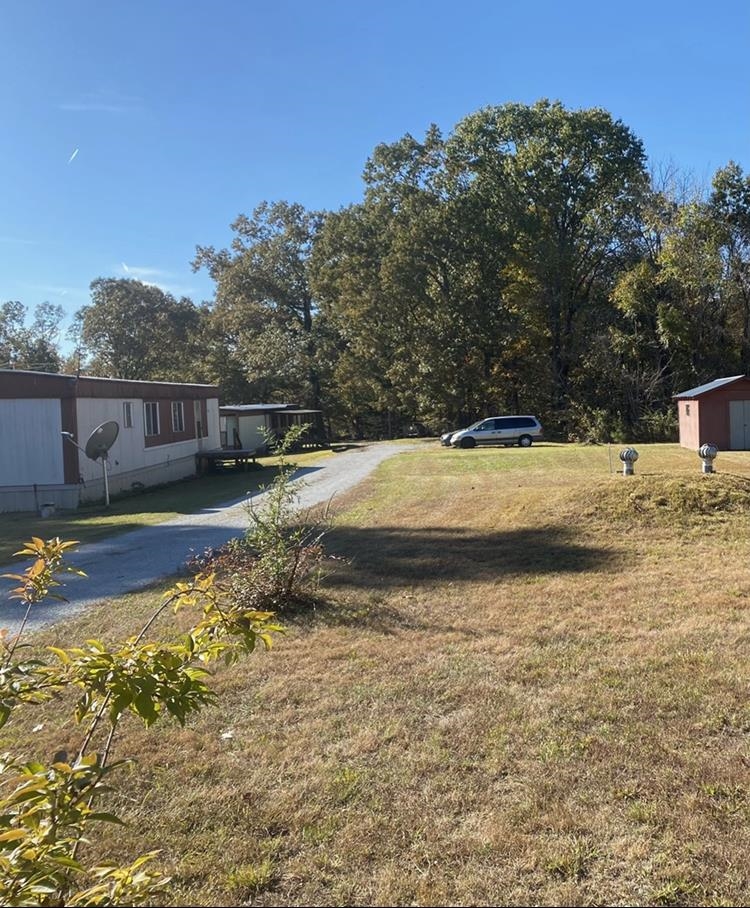 755 Old Toone Road Toone, TN 38381 - Photo 5 of 25 a view of a backyard with swimming pool