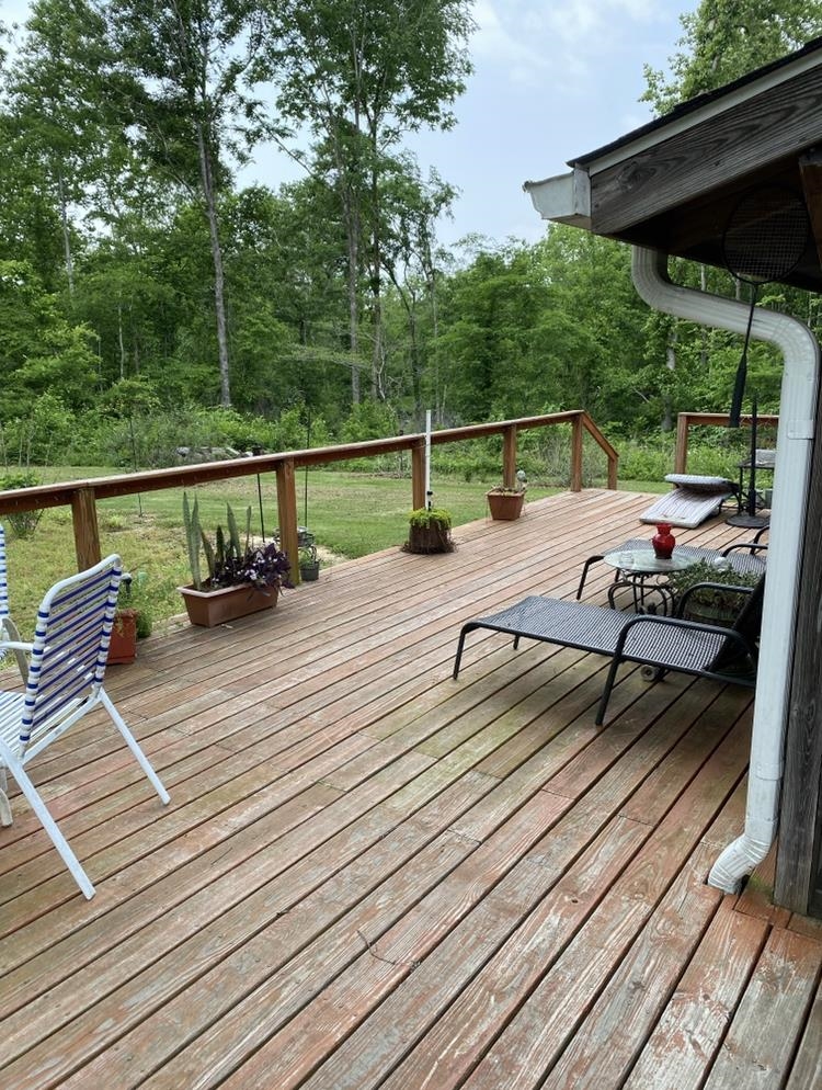 755 Old Toone Road Toone, TN 38381 - Photo 9 of 25 a view of sitting area on roof deck