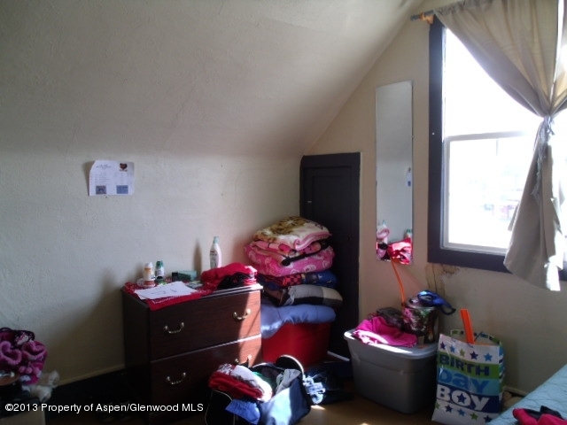 126 West 4th Street Rifle, CO 81650 - Photo 7 of 16 a kids room with toys and toys