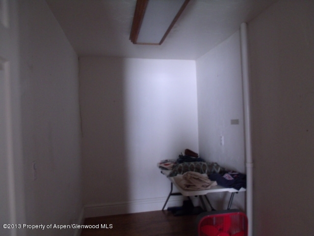 126 West 4th Street Rifle, CO 81650 - Photo 9 of 16 a room with water heater on the side of a wall