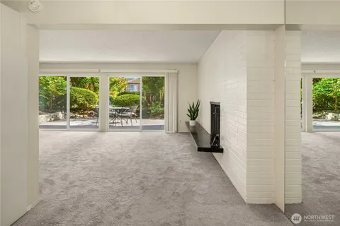 a view of a room with a large window