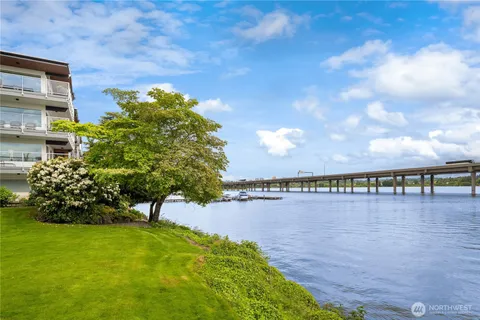 a view of a lake with a garden
